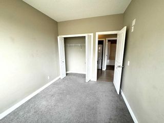 Photo 12: 108 10 Panatella Road NW in Calgary: Panorama Hills Apartment for sale : MLS®# A2128651