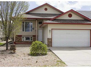 Photo 1: 11 WESTFALL Crescent in : Okotoks Residential Detached Single Family for sale : MLS®# C3619758
