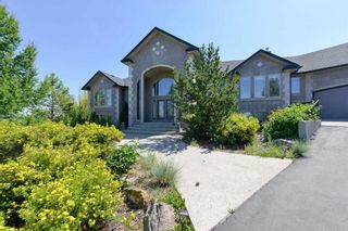 Photo 2: 104 Grizzly Rise in Rural Rocky View County: Rural Rocky View MD Detached for sale : MLS®# A2068576