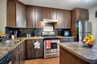 Photo 3: 903 2445 Kingsland Road SE: Airdrie Row/Townhouse for sale : MLS®# A1251927
