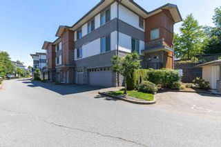 Photo 1: 1 34248 KING Road in Abbotsford: Poplar Townhouse for sale in "ARGYLE" : MLS®# R2708840