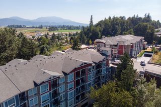 Photo 3: 310 2238 WHATCOM Road in Abbotsford: Abbotsford East Condo for sale in "Waterleaf" : MLS®# R2607465