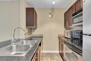 Photo 6: 1406 403 Mackenzie Way SW: Airdrie Apartment for sale : MLS®# A2131291