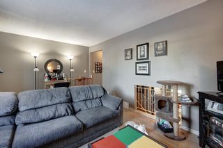 Photo 12: 2 123 Queensland Drive SE in Calgary: Queensland Row/Townhouse for sale : MLS®# A2010360