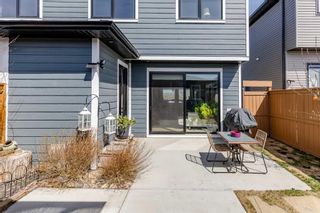 Photo 28: 37 River Heights Drive: Cochrane Semi Detached (Half Duplex) for sale : MLS®# A2130528