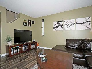 Photo 4: 310 COVENTRY Road NE in Calgary: Coventry Hills House for sale : MLS®# C3655004