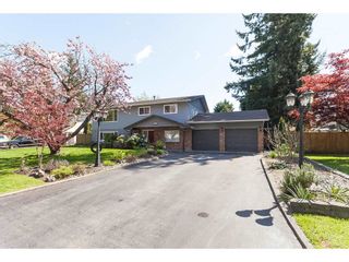 Photo 1: 20940 45A Avenue in Langley: Langley City House for sale in "uplands" : MLS®# R2361549