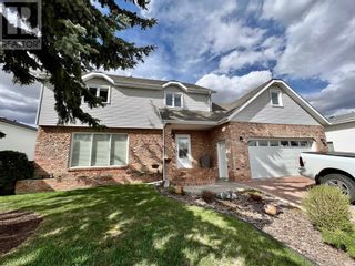 Photo 1: 2014 5A Avenue in Wainwright: House for sale : MLS®# A2028407