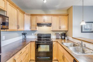Photo 5: 1306 175 Panatella Hill NW in Calgary: Panorama Hills Apartment for sale : MLS®# A2049903