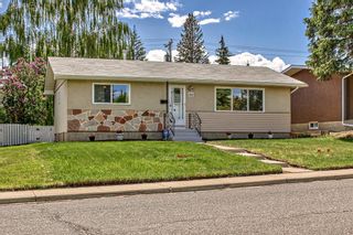 Photo 1: 911 104 Avenue SW in Calgary: Southwood Detached for sale : MLS®# A2054018