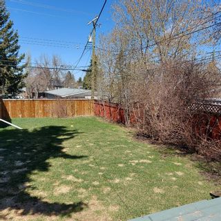 Photo 5: 208 25 Avenue NW in Calgary: Tuxedo Park Detached for sale : MLS®# A1109100