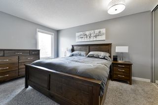 Photo 21: 306 Coachway Lane SW in Calgary: Coach Hill Row/Townhouse for sale : MLS®# A1211202