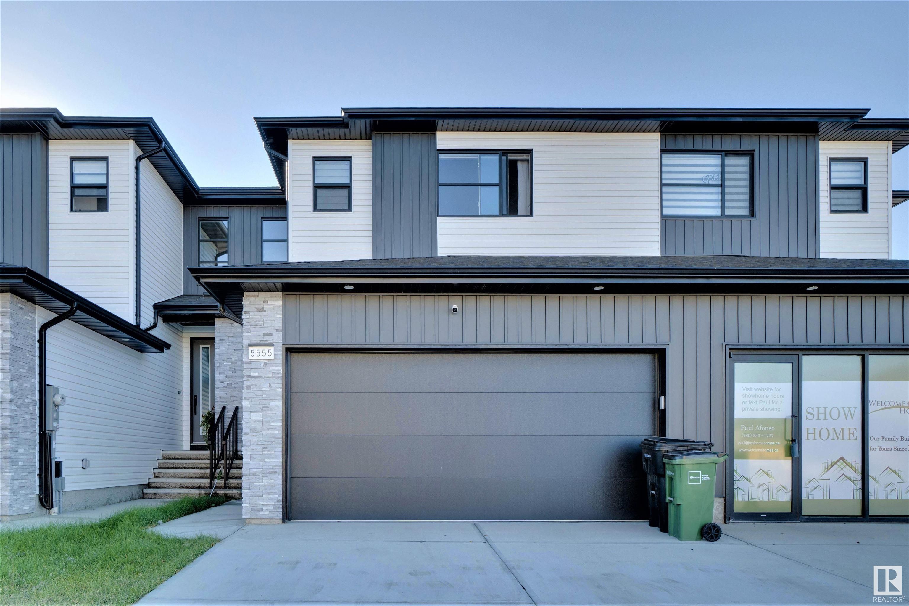 Main Photo: 5555 SCHONSEE Drive in Edmonton: Zone 28 Attached Home for sale : MLS®# E4314047
