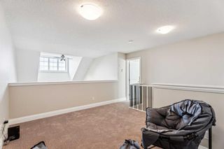 Photo 18: 2407 15 Sunset Square: Cochrane Apartment for sale : MLS®# A2112968