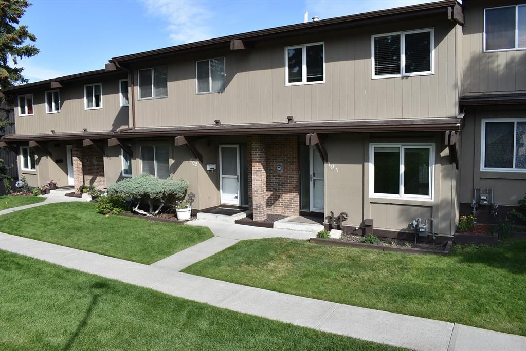 Main Photo: 101 1055 72 Avenue NW in Calgary: Huntington Hills Row/Townhouse for sale : MLS®# A2002224