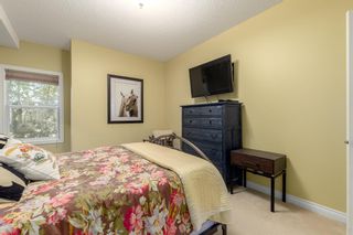 Photo 24: 210 248 Sunterra Ridge Place: Cochrane Apartment for sale : MLS®# A2053195