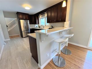 Photo 10: 2539 Assiniboine Crescent in Winnipeg: Silver Heights Residential for sale (5F)  : MLS®# 202306574