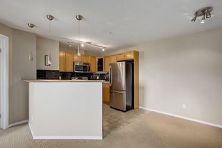 Photo 5: 2308 8 BRIDLECREST Drive SW in Calgary: Bridlewood Condo for sale