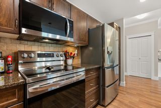 Photo 12: 206 2068 SANDALWOOD Crescent in Abbotsford: Central Abbotsford Condo for sale in "The Sterling" : MLS®# R2877425