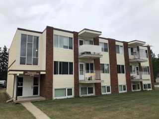 Photo 1: 559 9 Avenue SW: High River Multi Family for sale : MLS®# A1136219
