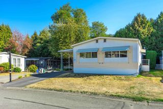 Photo 3: 39 13507 81 Avenue in Surrey: Queen Mary Park Surrey Manufactured Home for sale in "Park Boulevard Estates" : MLS®# R2727845
