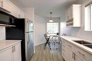Photo 9: 43 Sun Harbour Road SE in Calgary: Sundance Row/Townhouse for sale : MLS®# A2057416