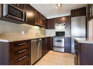 Photo 10: 306 833 W 16TH Avenue in Vancouver: Fairview VW Condo for sale in "The Emerald" (Vancouver West)  : MLS®# V1063181