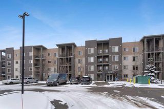 Photo 2: 4112 403 Mackenzie Way SW: Airdrie Apartment for sale : MLS®# A2117666