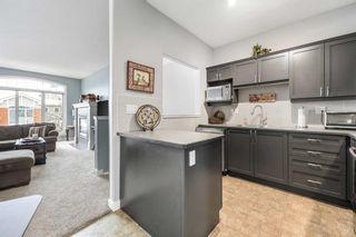 Photo 9: 404 8000 Wentworth Drive SW in Calgary: West Springs Row/Townhouse for sale : MLS®# A2128381