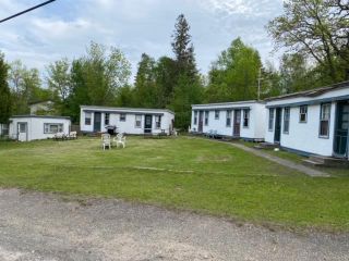 Photo 1: 26 Parkview Avenue in Grand Marais: House for sale : MLS®# 202326216