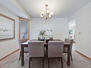 Photo 11: 128 Edgebank Circle NW in Calgary: Edgemont Detached for sale : MLS®# A2129474