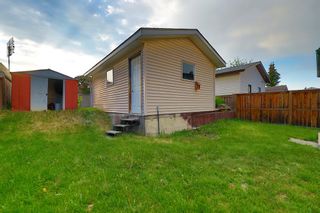 Photo 5: 31 Shawcliffe Green SW in Calgary: Shawnessy Detached for sale : MLS®# A2054918