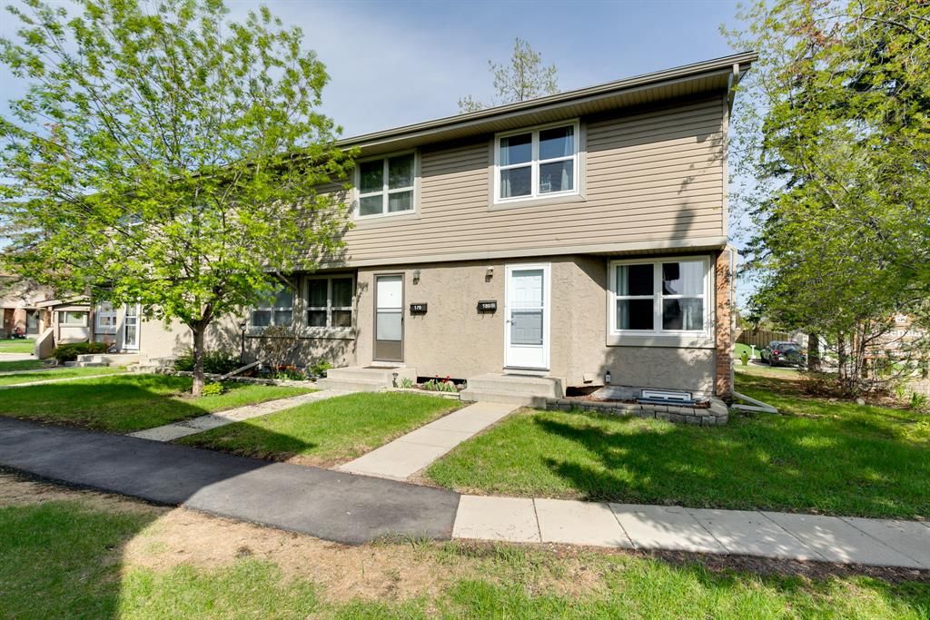 Main Photo: 180 123 Queensland Drive SE in Calgary: Queensland Row/Townhouse for sale : MLS®# A2050106