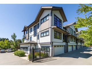 Photo 1: 201 13585 16 Avenue in Surrey: Crescent Bch Ocean Pk. Townhouse for sale in "Bayview Terrace" (South Surrey White Rock)  : MLS®# R2288990