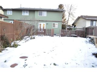 Photo 8: 557 SUMMERWOOD Place SE: Airdrie Residential Attached for sale : MLS®# C3592604