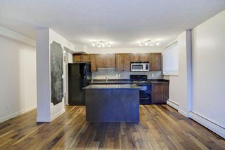 Photo 3: 101 4127 Bow Trail SW in Calgary: Rosscarrock Apartment for sale : MLS®# A1157364