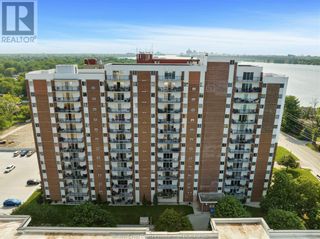 Photo 1: 8591 RIVERSIDE DRIVE East Unit# 501 in Windsor: Condo for sale : MLS®# 23013484