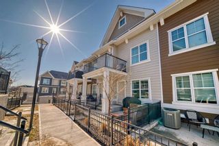 Photo 2: 811 Cranbrook Walk SE in Calgary: Cranston Row/Townhouse for sale : MLS®# A2115536