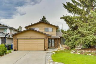 Photo 1: 7 WOODGREEN Crescent SW in Calgary: Woodlands Detached for sale : MLS®# C4245286