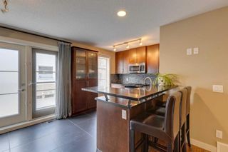 Photo 6: 25 Aspen Hills Common SW in Calgary: Aspen Woods Row/Townhouse for sale : MLS®# A2080763