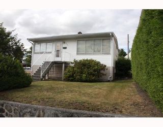 Photo 1: 1707 PRESTWICK Drive in Vancouver: Fraserview VE House for sale (Vancouver East)  : MLS®# V749175