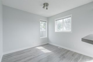 Photo 12: 126 Panatella Park NW in Calgary: Panorama Hills Row/Townhouse for sale : MLS®# A1254731