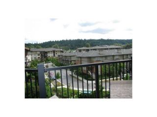 Photo 9: 409 300 KLAHANIE Drive in Port Moody: Port Moody Centre Condo for sale in "TIDES" : MLS®# R2213447