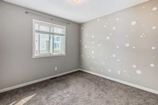 Photo 27: 227 Panatella Walk NW in Calgary: Panorama Hills Row/Townhouse for sale : MLS®# A2074189