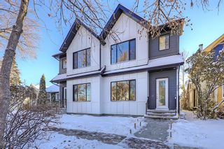 Main Photo: 325 8 Avenue NE in Calgary: Crescent Heights Semi Detached (Half Duplex) for sale : MLS®# A2011330