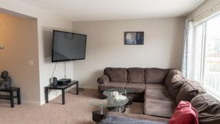Photo 4: 22 River Heights Crescent: Cochrane Semi Detached for sale : MLS®# A1102488