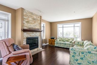 Photo 2: 316 8880 202 Street in Langley: Walnut Grove Condo for sale in "The Residence" : MLS®# R2294542