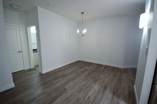 Photo 2: 207 1441 23 Avenue SW in Calgary: Bankview Apartment for sale : MLS®# A1200789