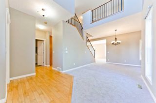Photo 7: 59 St Moritz Terrace SW in Calgary: Springbank Hill Detached for sale : MLS®# A2080924