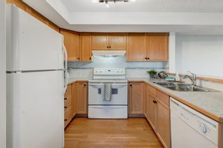 Photo 14: 408 300 Edwards Way NW: Airdrie Apartment for sale : MLS®# A1258653